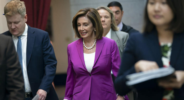 House Speaker Nancy Pelosi, D-Calif., arrives for a closed-door session with her caucus before a vote on a resolution condemning what she called "racist comments" by President Donald Trump at the Capitol in Washin House Speaker Nancy Pelosi, D-Calif., arrives for a closed-door session with her caucus before a vote on a resolution condemning what she called "racist comments" by President Donald Trump at the Capitol in Washin
