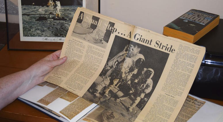 Cathy Goff shows her with newspaper clippings about the Apollo 11 moon landing mission at her home in King, N.C Cathy Goff shows her with newspaper clippings about the Apollo 11 moon landing mission at her home in King, N.C