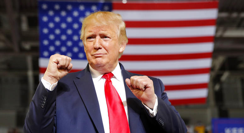 In this July 17, 2019, photo, President Donald Trump arrives to speak at a campaign rally at Williams Arena in Greenville, N.C. AP DO NOT USE