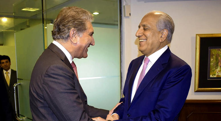 n this photo released by the Foreign Office, Pakistan's Foreign Minister Shah Mehmood Qureshi, left, receives U.S. envoy Zalmay Khalilzad at the Foreign Ministry in Islamabad, Pakistan, Thursday, Aug. 1, 2019. AP DO NOT USE