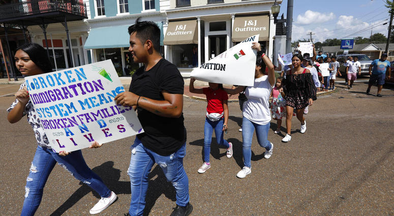 children of mainly Latino immigrant parents hold signs in support of them children of mainly Latino immigrant parents hold signs in support of them