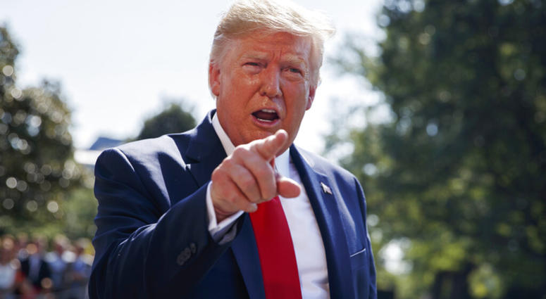 In this Aug. 9, 2019, photo, President Donald Trump talks to reporters on the South Lawn of the White House in Washington. AP DO NOT USE
