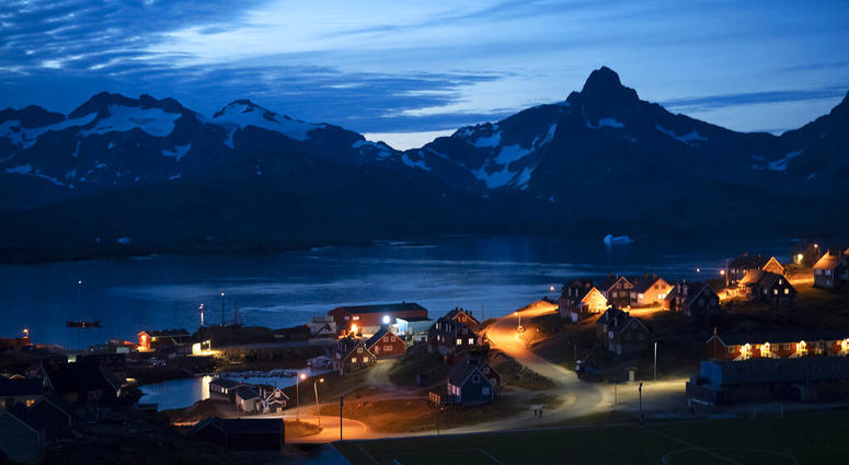 homes are illuminated after the sunset in Tasiilaq, Greenland. ( homes are illuminated after the sunset in Tasiilaq, Greenland. (
