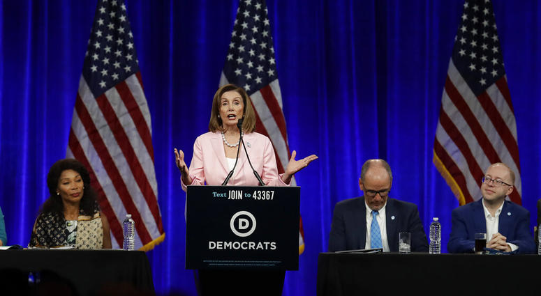 U.S. House Speaker Nancy Pelosi gestures while speaking at the Democratic National Committee's summer meeting Friday, Aug. 23, U.S. House Speaker Nancy Pelosi gestures while speaking at the Democratic National Committee's summer meeting Friday, Aug. 23,