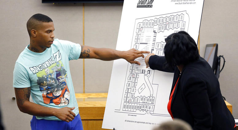 In this Tuesday, Sept. 24, 2019, photo, victim Botham Jean's neighbor Joshua Brown, left, answers questions from Assistant District Attorney LaQuita Long,