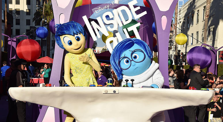 HOLLYWOOD, CA - JUNE 08: Film characters Joy and Sadness attend the Los Angeles premiere of Disney-Pixar's "Inside Out" at the El Capitan Theatre on June 8, 2015 in Hollywood, California.