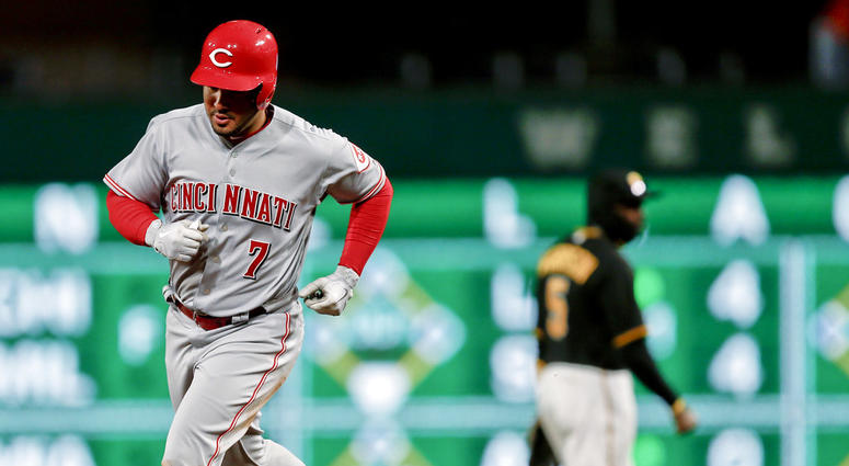 Cincinnati Reds' Eugenio Suarez, Pittsburgh Pirates' Josh Harrison Cincinnati Reds' Eugenio Suarez, Pittsburgh Pirates' Josh Harrison