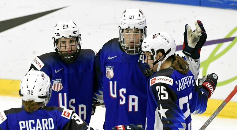 Michell Picard, Dani Cameranesi, Hilary Knight and Alex Carpenter of USA celebrate after scoring their team's first goal during the IIHF Women's Ice Hockey World Championships quarterfinal match between USA and Japan in Espoo, Finland, Thursday, April 11, Michell Picard, Dani Cameranesi, Hilary Knight and Alex Carpenter of USA celebrate after scoring their team's first goal during the IIHF Women's Ice Hockey World Championships quarterfinal match between USA and Japan in Espoo, Finland, Thursday, April 11,