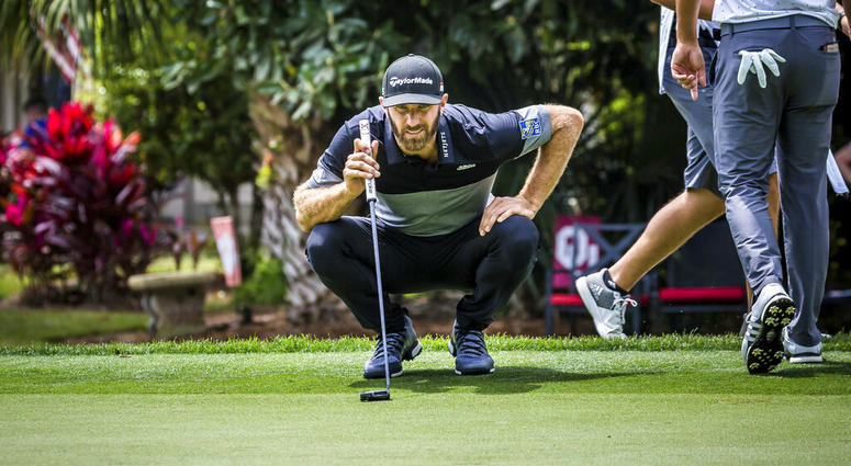 Dustin Johnson eyes his birdie putt on the 8th green during the second round of the RBC Heritage golf tournament in Hilton Head Island, S.C., Friday, April 19, 2019. Dustin Johnson eyes his birdie putt on the 8th green during the second round of the RBC Heritage golf tournament in Hilton Head Island, S.C., Friday, April 19, 2019.