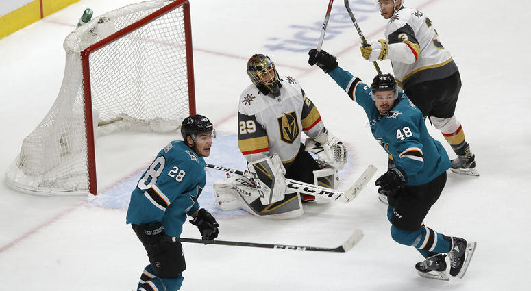 Vegas Golden Knights goaltender Marc-Andre Fleury, center, reacts between San Jose Sharks right wing Timo Meier (28) and center Tomas Hertl (48) after Sharks' Logan Couture scored a goal during the third period of Game 7 AP DO NOT USE