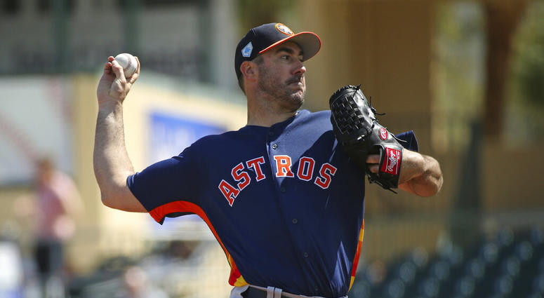 Houston Astros pitcher Justin Verlander throws during the first inning of a spring training baseball game against the Miami Marlins at the Roger Dean Chevrolet Stadium on Thursday, in Jupiter, Fla. Houston Astros pitcher Justin Verlander throws during the first inning of a spring training baseball game against the Miami Marlins at the Roger Dean Chevrolet Stadium on Thursday, in Jupiter, Fla.
