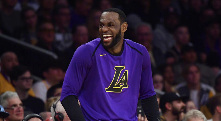 Los Angeles Lakers forward LeBron James laughs as he waits to check in to the team's NBA basketball game against the Charlotte Hornets during the second half Friday, March 29, 2019, in Los Angeles. The Lakers won 129-115. Los Angeles Lakers forward LeBron James laughs as he waits to check in to the team's NBA basketball game against the Charlotte Hornets during the second half Friday, March 29, 2019, in Los Angeles. The Lakers won 129-115.