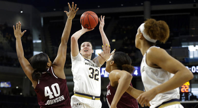Notre Dame's Jessica Shepard (32) shoots over Texas A&M's Ciera Johnson (40) during the first half of a regional semifinal game in the NCAA women's college basketball tournament, Saturday, March 30, 2019, in Chicago. Notre Dame's Jessica Shepard (32) shoots over Texas A&M's Ciera Johnson (40) during the first half of a regional semifinal game in the NCAA women's college basketball tournament, Saturday, March 30, 2019, in Chicago.