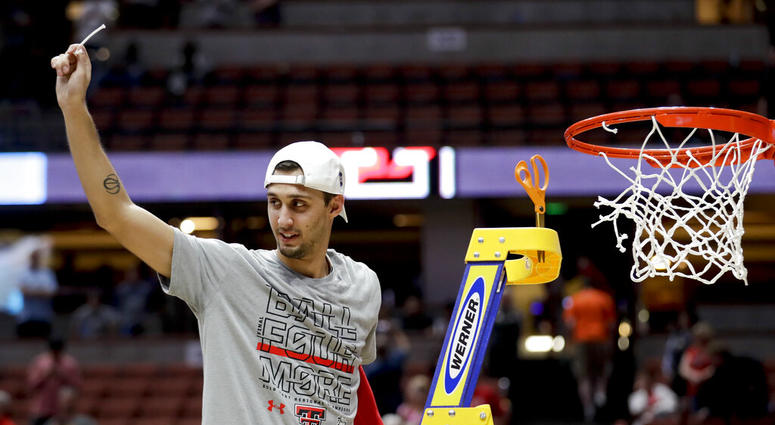Texas Tech guard Davide Moretti holds up a piece of the net after the team's win over Gonzaga in the West Regional final in the NCAA men's college basketball tournament Saturday, March 30, 2019, in Anaheim, Calif. Texas Tech won 75-69. Texas Tech guard Davide Moretti holds up a piece of the net after the team's win over Gonzaga in the West Regional final in the NCAA men's college basketball tournament Saturday, March 30, 2019, in Anaheim, Calif. Texas Tech won 75-69.