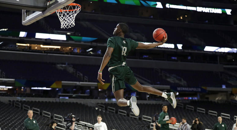 Michigan State forward Gabe Brown dunks the ball during a practice session for the semifinals of the Final Four NCAA college basketball tournament, Friday, April 5, 2019, in Minneapolis. Michigan State forward Gabe Brown dunks the ball during a practice session for the semifinals of the Final Four NCAA college basketball tournament, Friday, April 5, 2019, in Minneapolis.