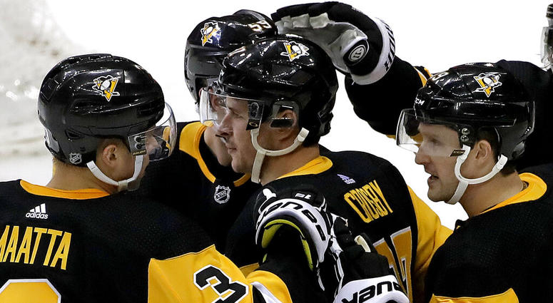 New York Rangers goaltender Alexandar Georgiev (40) blocks a shot by Pittsburgh Penguins' Jared McCann (19) during the second period of an NHL hockey game in Pittsburgh, Saturday, April 6, 2019. New York Rangers goaltender Alexandar Georgiev (40) blocks a shot by Pittsburgh Penguins' Jared McCann (19) during the second period of an NHL hockey game in Pittsburgh, Saturday, April 6, 2019.