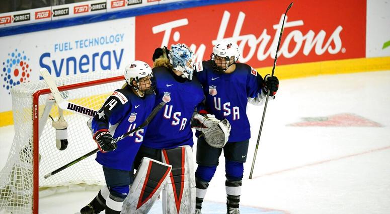 Brianna Decker, left, Alex Rigsby and Cayla Barnes of USA celebrate winning the 2019 IIHF Women's World Championships preliminary match between USA and Canada in Espoo, Finland, Saturday April 6, 2019. ( Brianna Decker, left, Alex Rigsby and Cayla Barnes of USA celebrate winning the 2019 IIHF Women's World Championships preliminary match between USA and Canada in Espoo, Finland, Saturday April 6, 2019.