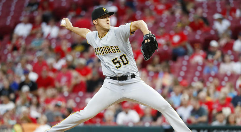 Pittsburgh Pirates starting pitcher Jameson Taillon throws during the first inning of a baseball game against the Cincinnati Reds DO NOT USE