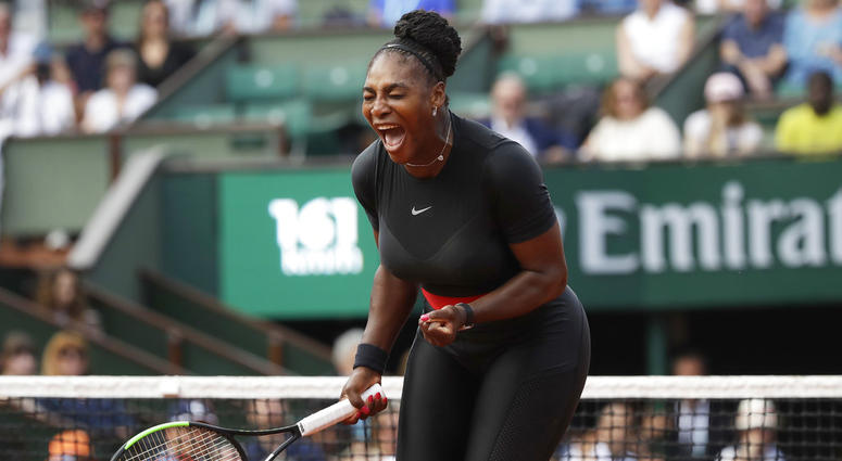 erena Williams of the U.S. clenches her fist after scoring a point against Krystina Pliskova of the Czech Republic during their first round match of the French Open DO NOT USE