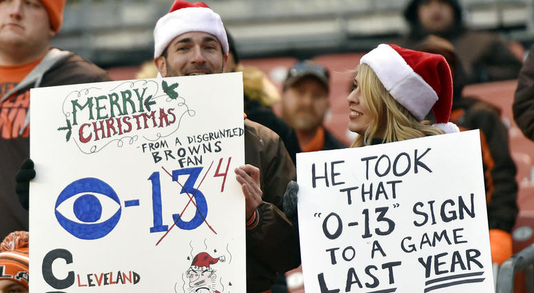 , Cleveland Browns fans hold up signs after the Baltimore Ravens defeated the Browns in an NFL football game in Cleveland. Will the Browns win a game? Yes they will, maybe even in Week 1 at home against their archrivals, the Steelers DO NOT USE