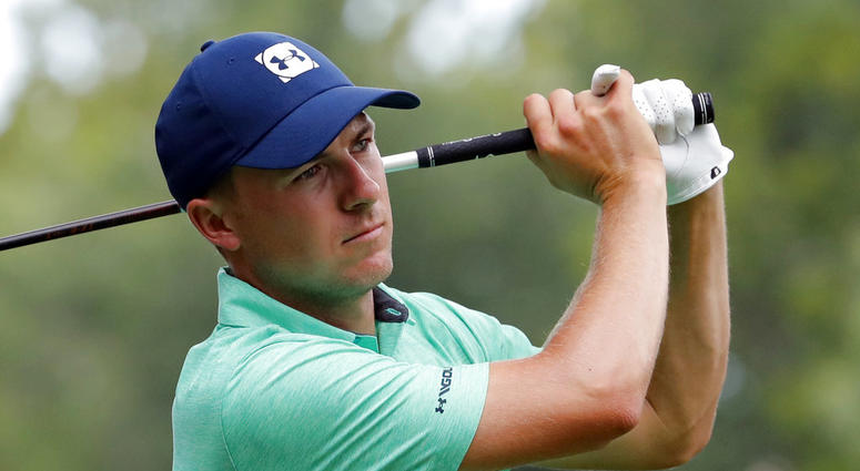 Jordan Spieth watches his tee shot on the 15th hole during a practice round for the PGA Championship golf tournament at Bellerive Country Club, Wednesday, Aug. 8, 2018, in St. Louis. DO NOT USE