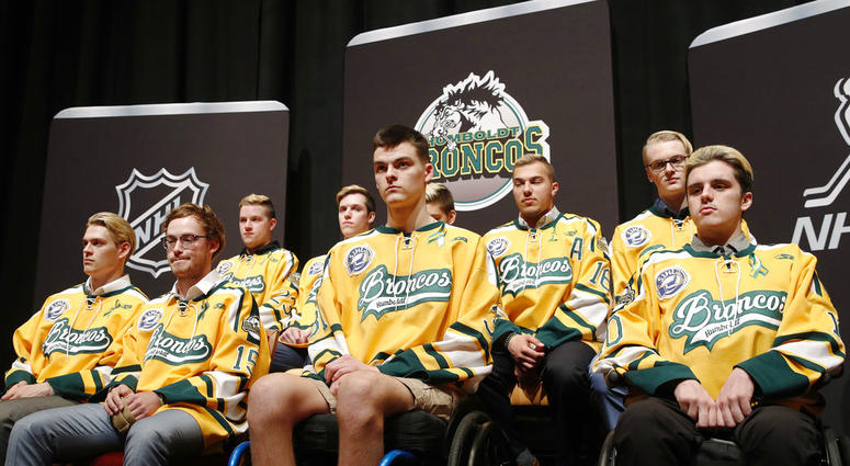 In this June 19, 2018, file photo, members of the Humboldt Broncos hockey team attend a news conference in Las Vegas. DO NOT USE