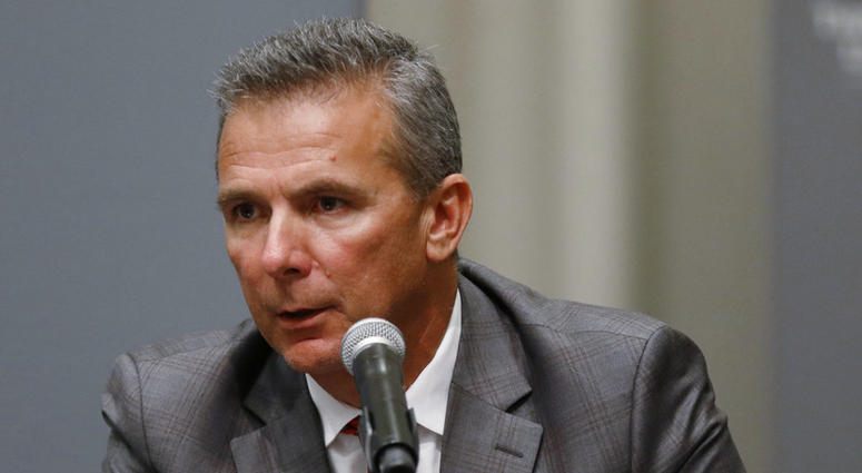 Aug. 22, 2018, file photo, Ohio State football coach Urban Meyer makes a statement during a news conference in Columbus, Ohio. DO NOT USE
