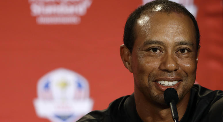 Tiger Woods smiles he speaks during a news conference where he was announced as a captain's pick to the 2018 U.S. Ryder Cup Team, Tuesday, Sept. 4, 2018, in West Conshohocken, Pa. DO NOT USE
