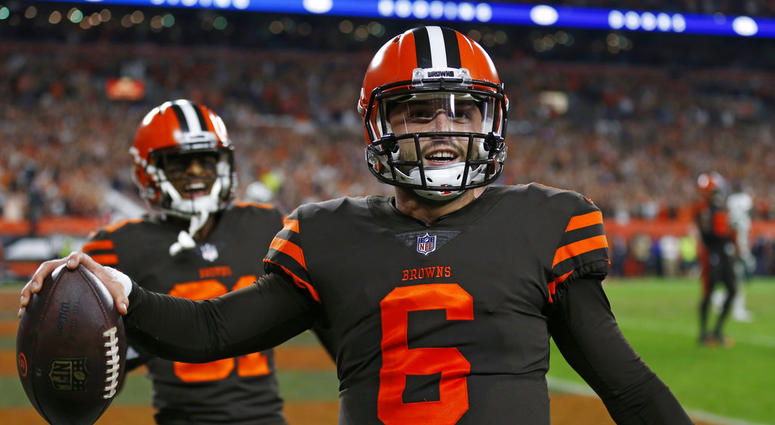 Cleveland Browns quarterback Baker Mayfield celebrates after scoring a 2-point conversion during the second half of an NFL football game against the New York Jets, Thursday, Sept. 20, 2018, in Cleveland. DO NOT USE