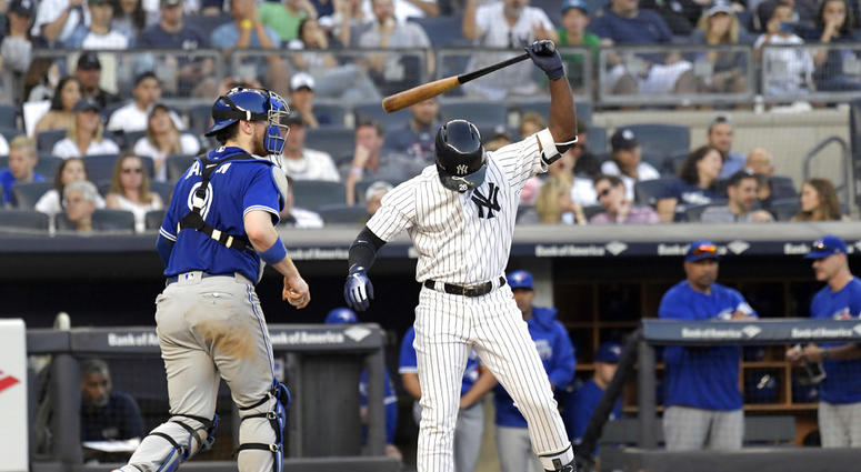In this Saturday, Sept. 15, 2018 file photo, New York Yankees' Andrew McCutchen reacts after striking out to end the seventh inning DO NOT USE