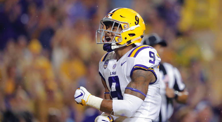 In this Sept. 29, 2018, file photo, LSU safety Grant Delpit (9) celebrates his sack of Mississippi quarterback Jordan Ta'amu during the first half DO NOT USE