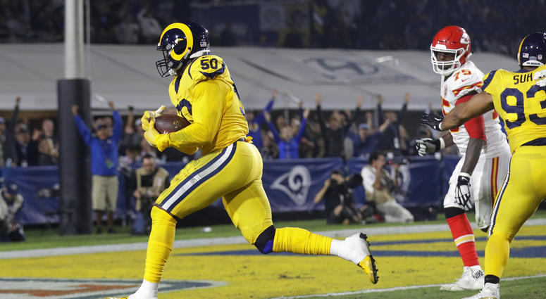 Los Angeles Rams outside linebacker Samson Ebukam (50) scores a touchdown after he recovered the ball on a fumble by Kansas City Chiefs quarterback Patrick Mahomes DO NOT USE