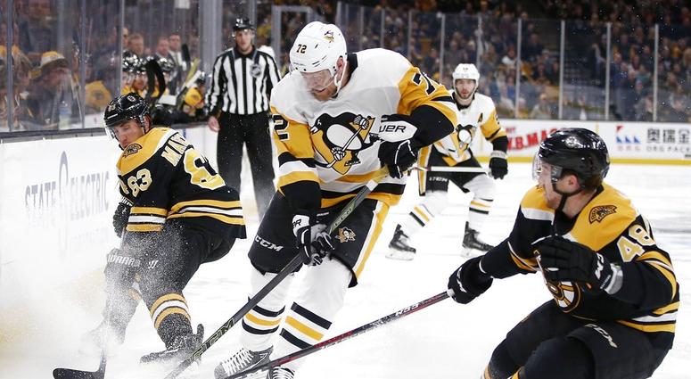 Pittsburgh Penguins' Patric Hornqvist (72) battles Boston Bruins' Brad Marchand Pittsburgh Penguins' Patric Hornqvist (72) battles Boston Bruins' Brad Marchand
