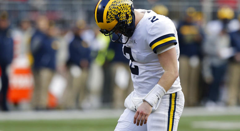 Michigan quarterback Shea Patterson reacts to throwing an incomplete pass against Ohio State Michigan quarterback Shea Patterson reacts to throwing an incomplete pass against Ohio State