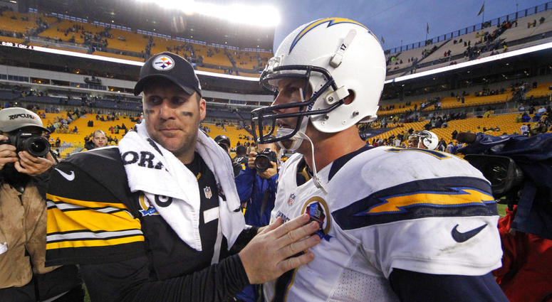 Pittsburgh Steelers quarterback Ben Roethlisberger (7) talks with San Diego Chargers quarterback Philip Rivers (17) after the Chargers won 34-24 in an NFL football game in Pittsburgh. The scoreboard might explode at Heinz Field as Class of 2004 QBs Philip DO NOT USE