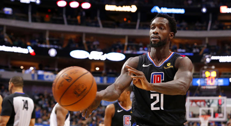 Los Angeles Clippers guard Patrick Beverley (21) throws a ball at a fan during the second half of an NBA basketball game against the Dallas Maverick Los Angeles Clippers guard Patrick Beverley (21) throws a ball at a fan during the second half of an NBA basketball game against the Dallas Maverick