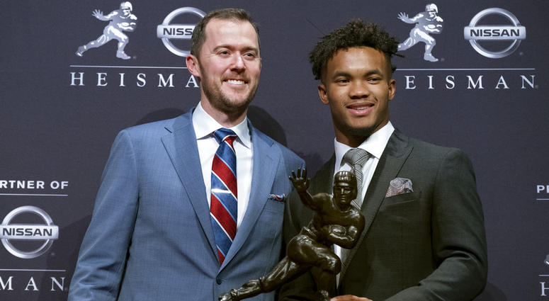 Oklahoma football coach Lincoln Riley, left, poses with Oklahoma quarterback Kyler Murray, winner of the Heisman Trophy Oklahoma football coach Lincoln Riley, left, poses with Oklahoma quarterback Kyler Murray, winner of the Heisman Trophy