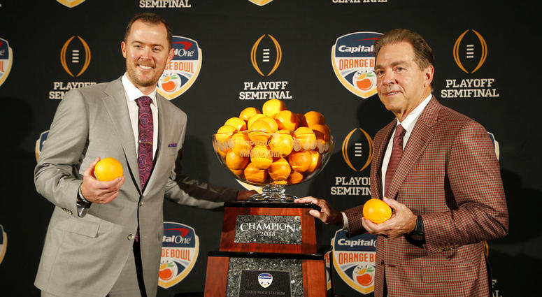 Alabama head coach Nick Saban, right, stands with Oklahoma head coach Lincoln Riley Alabama head coach Nick Saban, right, stands with Oklahoma head coach Lincoln Riley