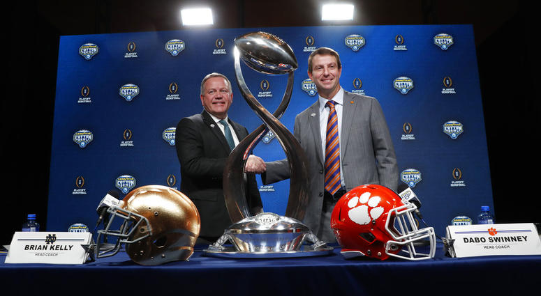 Notre Dame head coach Brian Kelly, left, and Clemson head coach Dabo Swinney DO NOT USE