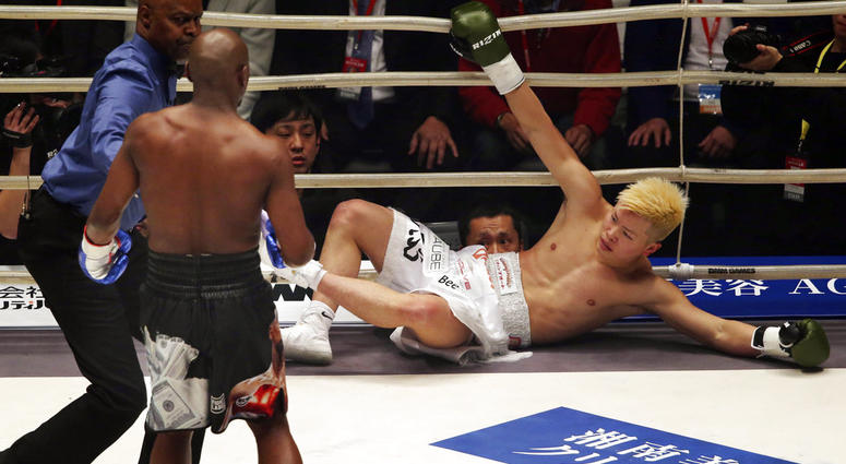 Japanese kickboxer Tenshin Nasukawa lies on the mat after being knocked out by Floyd Mayweather Jr. during first round of their three-round exhibition match on New Year's Eve DO NOT USE