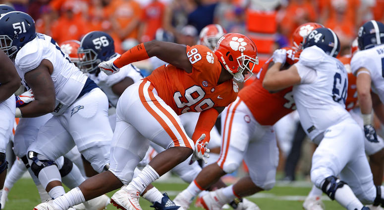 Clemson's Clelin Ferrell (99) rushes into the backfield during the first half of the team's NCAA college football game against Georgia Southern in Clemson Clemson's Clelin Ferrell (99) rushes into the backfield during the first half of the team's NCAA college football game against Georgia Southern in Clemson