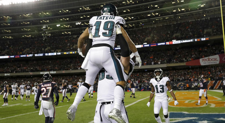 Philadelphia Eagles wide receiver Golden Tate (19) celebrates his touchdown reception with offensive tackle Lane Johnson (65) during the second half of an NFL wild-card playoff football game against the Chicago Bears Sunday, Jan. 6, 2019, in Chicago. DO NOT USE