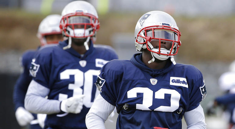 New England Patriots free safety Devin McCourty, front, and his brother cornerback Jason McCourty, left New England Patriots free safety Devin McCourty, front, and his brother cornerback Jason McCourty, left
