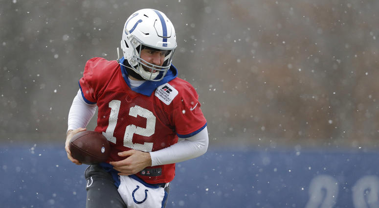 Indianapolis Colts quarterback Andrew Luck runs a drill during practice at the NFL football team's facility Indianapolis Colts quarterback Andrew Luck runs a drill during practice at the NFL football team's facility