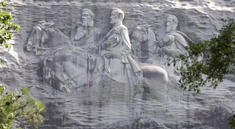 carving depicting Confederates Stonewall Jackson, Robert E. Lee and Jefferson Davis in Stone Mountain, Ga. AP DO NOT USE