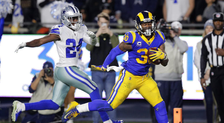 Los Angeles Rams running back Todd Gurley scores past Dallas Cowboys Los Angeles Rams running back Todd Gurley scores past Dallas Cowboys