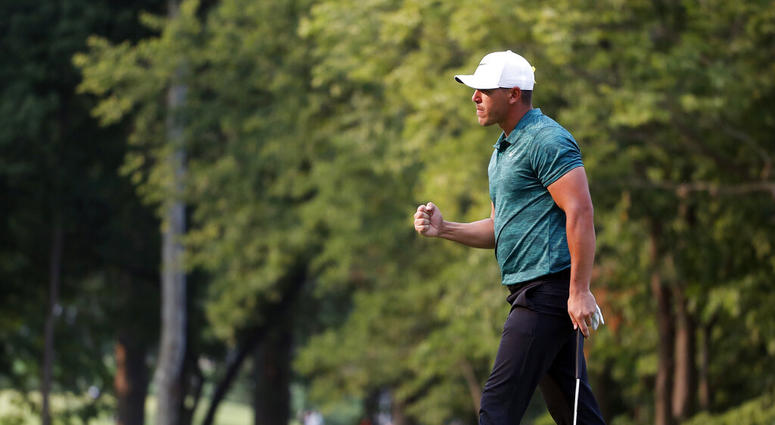Brooks Koepka celebrates after making his birdie putt on the 16th green during the final round of the PGA Championship golf tournament at Bellerive Country Club in St. Louis. Brooks Koepka celebrates after making his birdie putt on the 16th green during the final round of the PGA Championship golf tournament at Bellerive Country Club in St. Louis.