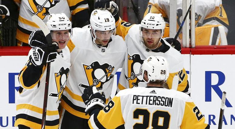 Pittsburgh Penguins defenseman Juuso Riikola (50) celebrates his goal against the Arizona Coyotes with center Derick Brassard (19), center Dominik Simon (12) and defenseman Marcus Pettersson (28) during the second period of an NHL hockey game Friday, Jan. Pittsburgh Penguins defenseman Juuso Riikola (50) celebrates his goal against the Arizona Coyotes with center Derick Brassard (19), center Dominik Simon (12) and defenseman Marcus Pettersson (28) during the second period of an NHL hockey game Friday, Jan.