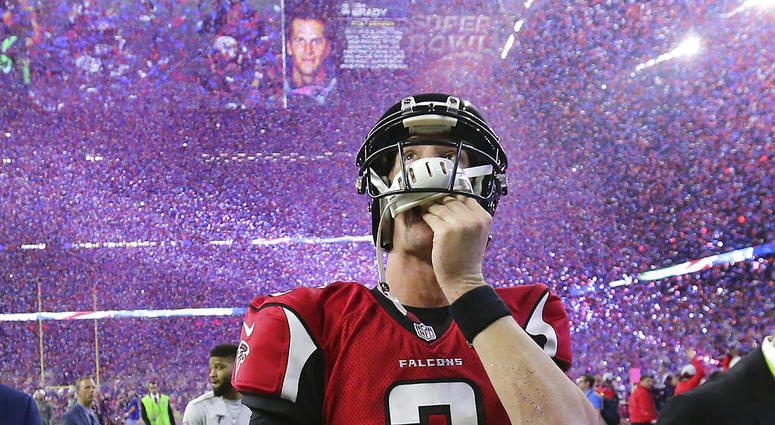 Atlanta Falcons quarterback Matt Ryan reacts after losing Super Bowl 51 as the screen flashes New England Patriots quarterback Tom Brady Atlanta Falcons quarterback Matt Ryan reacts after losing Super Bowl 51 as the screen flashes New England Patriots quarterback Tom Brady