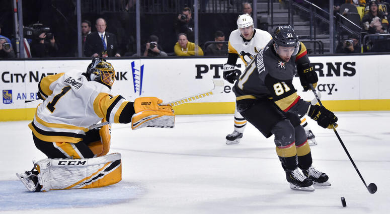 Vegas Golden Knights center Jonathan Marchessault (81) shoots against Pittsburgh Penguins goaltender Casey DeSmith (1 Vegas Golden Knights center Jonathan Marchessault (81) shoots against Pittsburgh Penguins goaltender Casey DeSmith (1